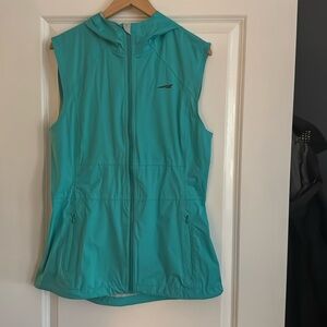Altra women’s all-weather running hooded vest.